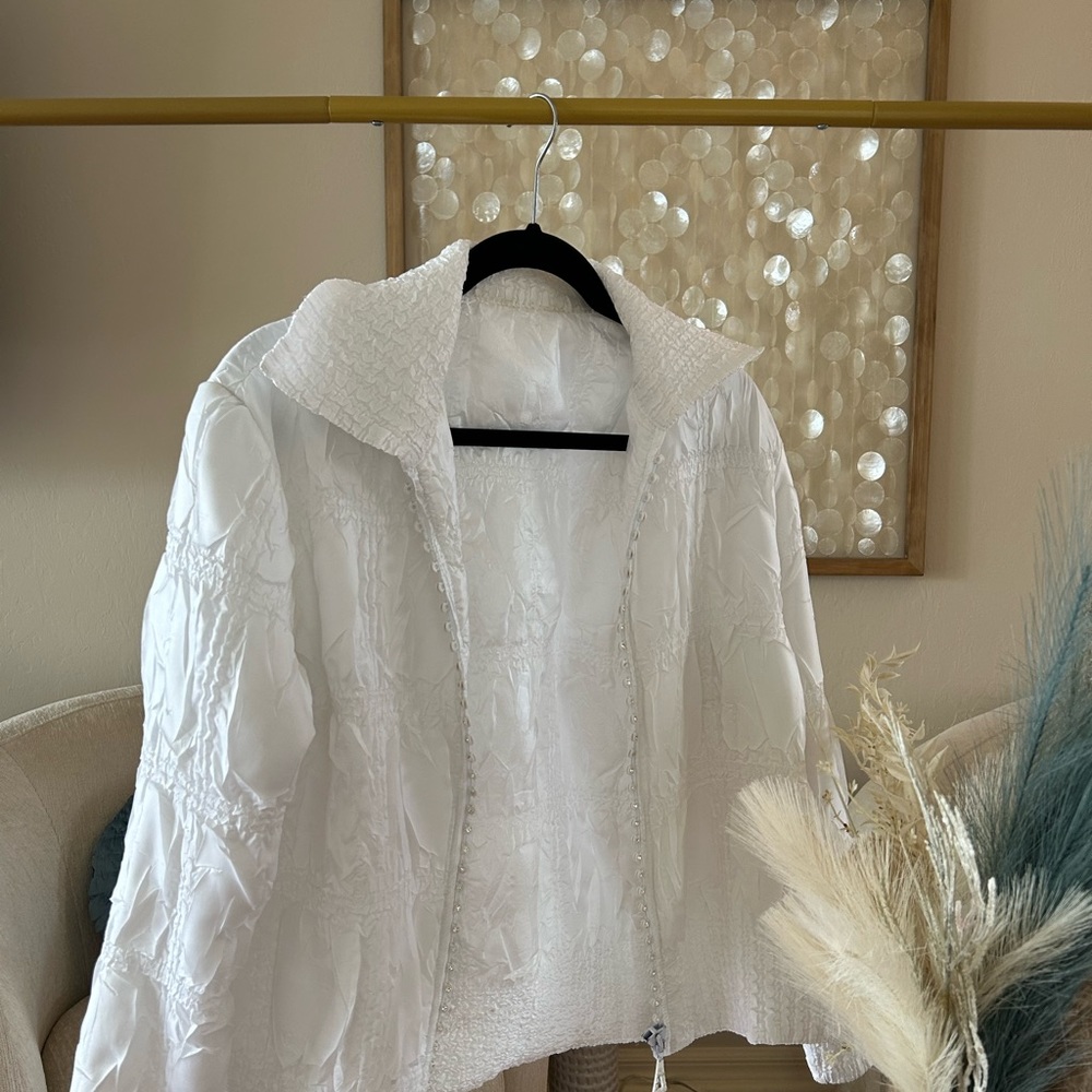 White athletic puffer coat